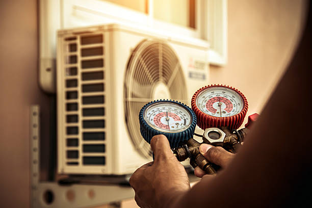 Professional Air Conditioning Service technician working in Saint Paul, AR
